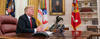 President Trump sits in the Oval Office