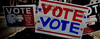 Signs encouraging people to vote