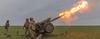 Firing a 122 mm howitzer D-30 in the Donetsk region, Ukraine, March 2023